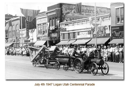 L. K. Wood drives down Main Street in Logan during the 1947 Centennial Parade.